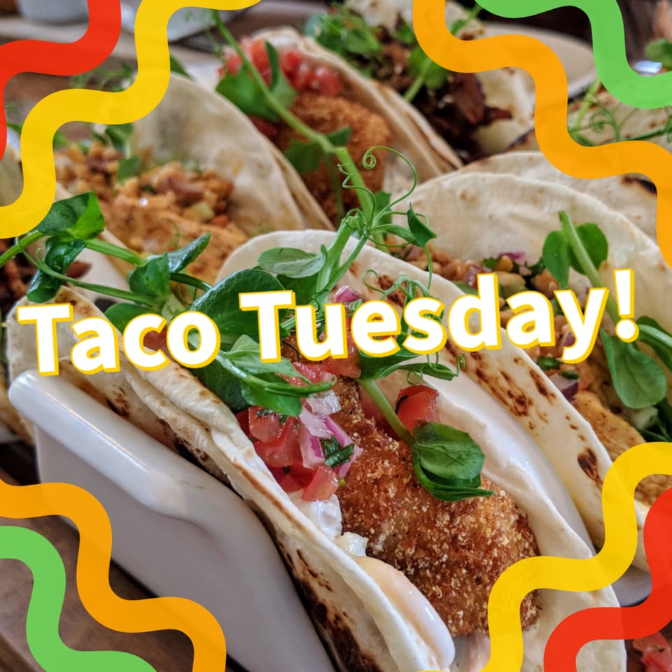 Close-up of several El Pollito Pio tacos with various fillings, fresh toppings, and "Taco Tuesday!" overlay.
